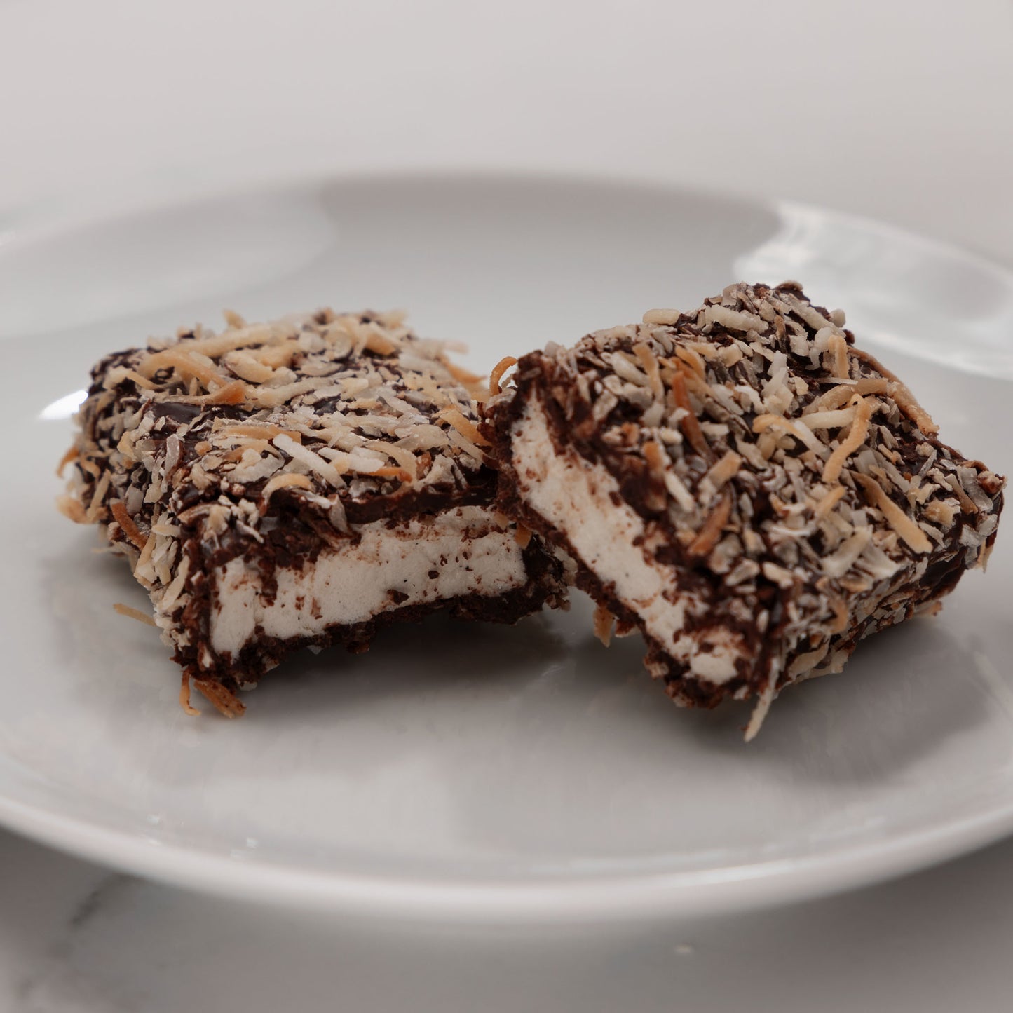 2 Dark Chocolate Dipped Marshmallow Rolled in Coconut Bars